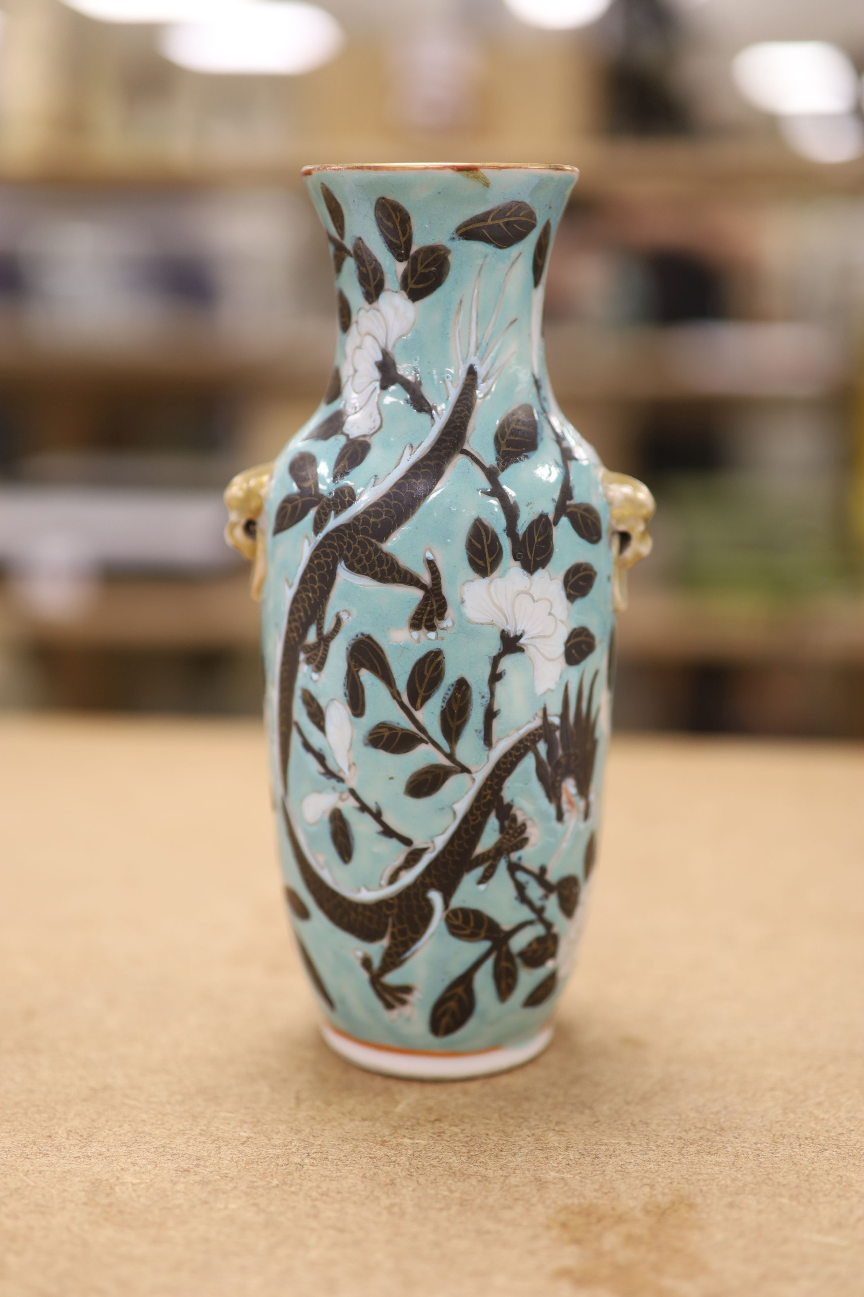 A Chinese turquoise glazed 'dragon' vase, c.1900, height 18cm